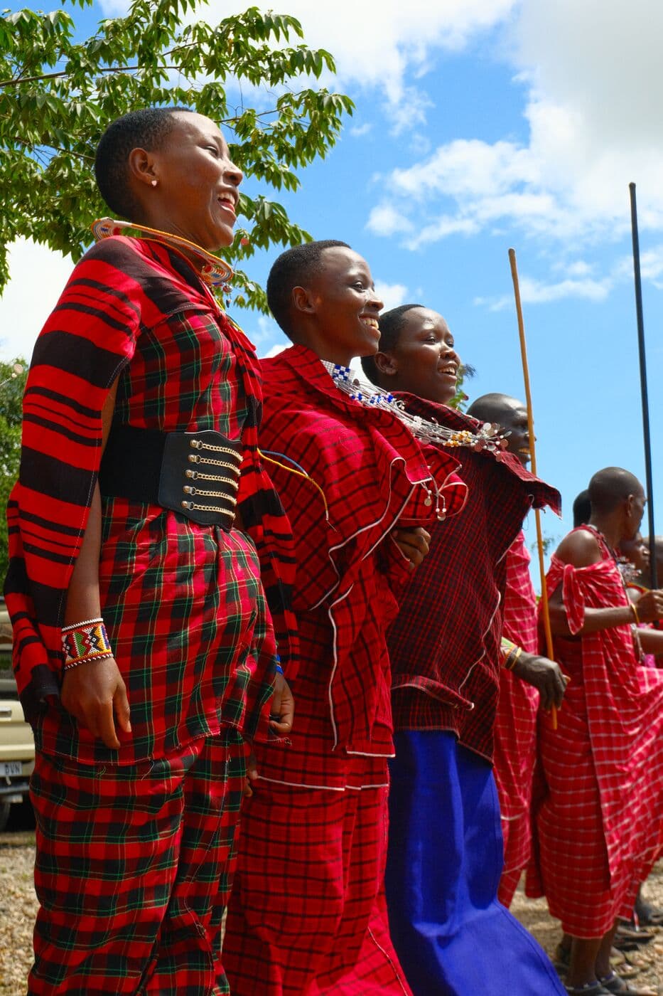 Maasai warriors standing on the grasslands of Northern Tanzania.